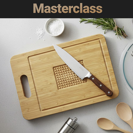 edelstahlmesser mit fleischbrett